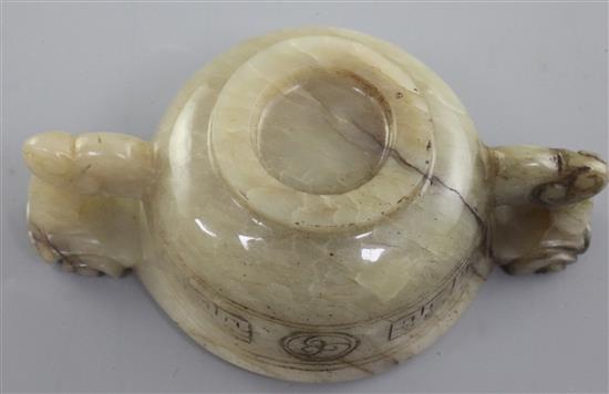 A Chinese white, grey and black veined jade two handled cup, 16th / 17th century, width 11.5cm